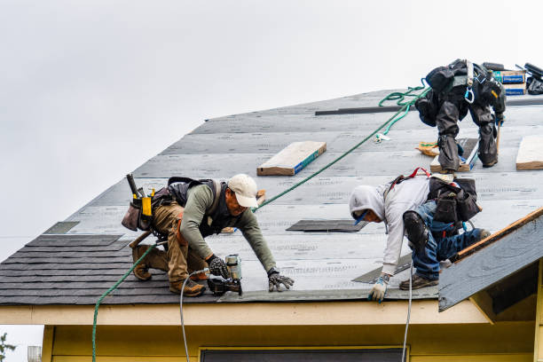 Professional Roofing technician working in Bayville, NY